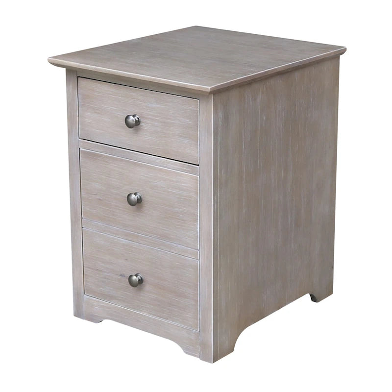 Aktenschrank mit zwei Schubladen sowie Schreibtisch und Stuhl